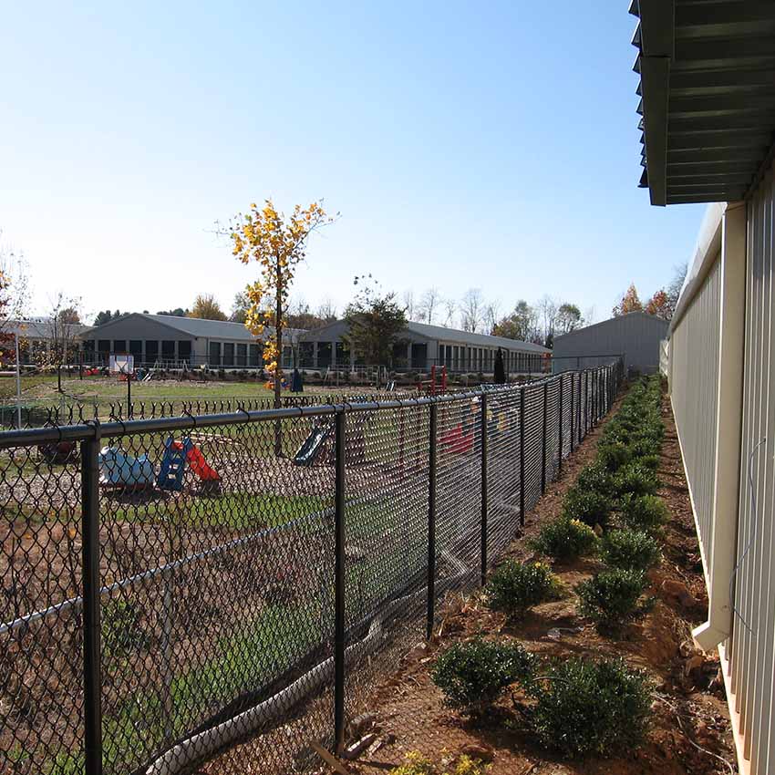 daycare-facility-fence Chainlink fence around a daycare center
