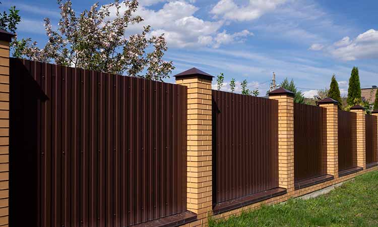 insert-noise-control-01 Brick and wood panel noise control fence