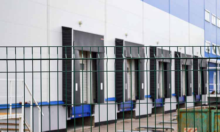 insert-wire-fence-at-loading-dock Wire fence around the loading dock